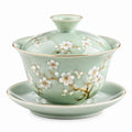 Tazza da tè con coperchio 180 ml in porcellana verde con decoro floreale e piattino